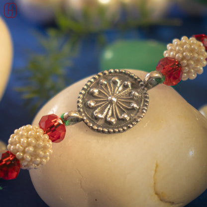 Hardik Jewels Pearl Bead Rakhi Silver - Handcrafted Elegance.