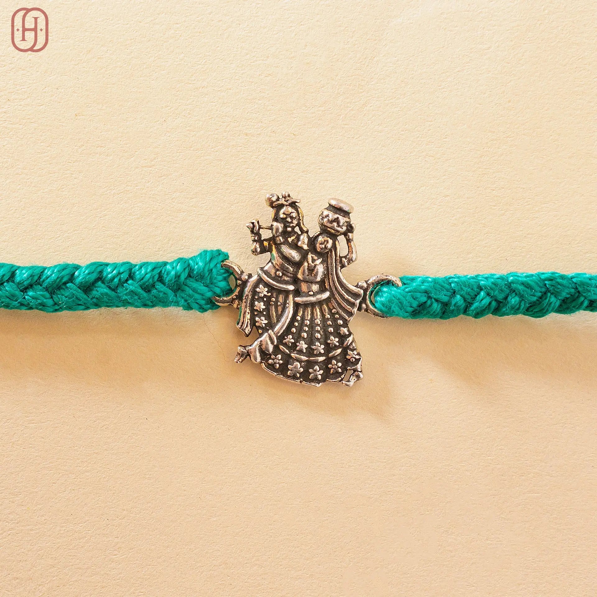 Hardik Jewels Radha Krishna Silver Rakhi for Celebration.