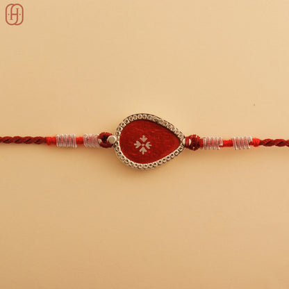 Hardik Jewels Red Enamel Teardrop Rakhi - Handcrafted Elegance.