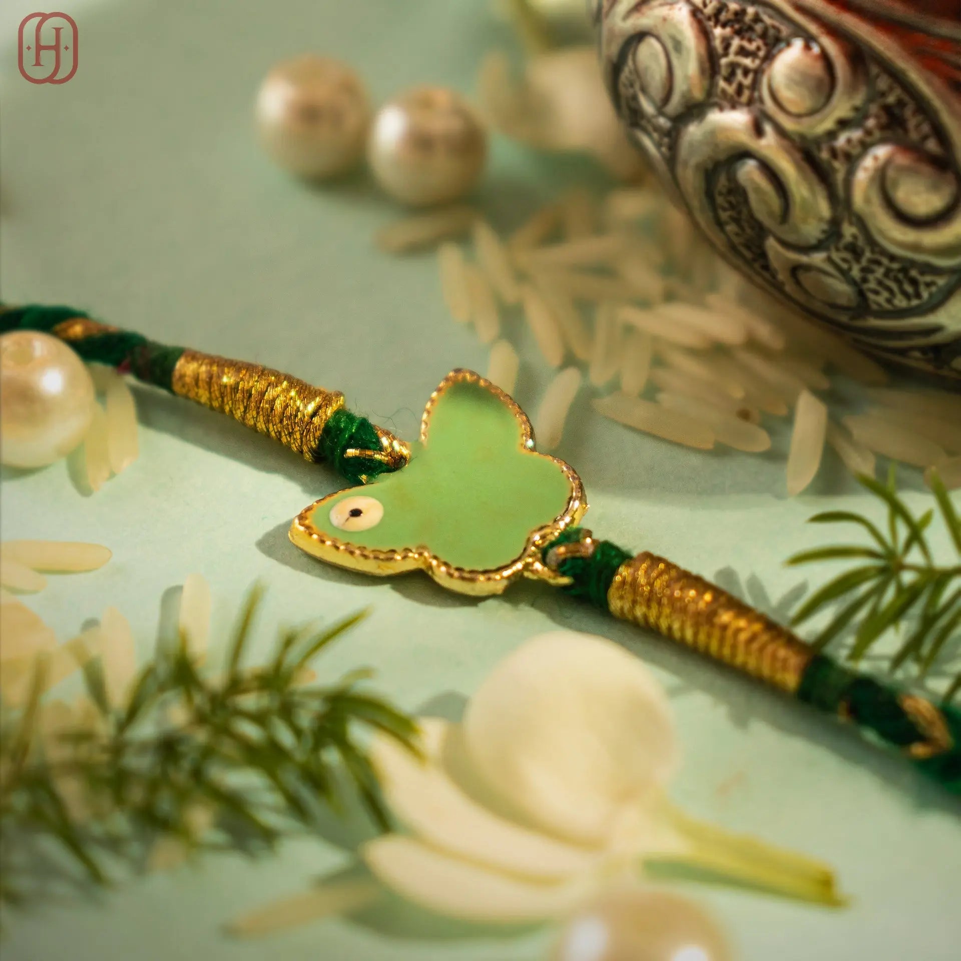 Hardik Jewels Silver Enamel Rakhi Online - Elegant Butterfly Design.