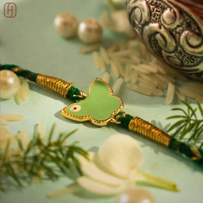 Hardik Jewels Silver Enamel Rakhi Online - Elegant Butterfly Design.