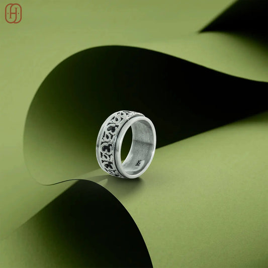 Silver ring featuring a dome of small blue stones by Hardik Jewels Silver Om Band jewelry