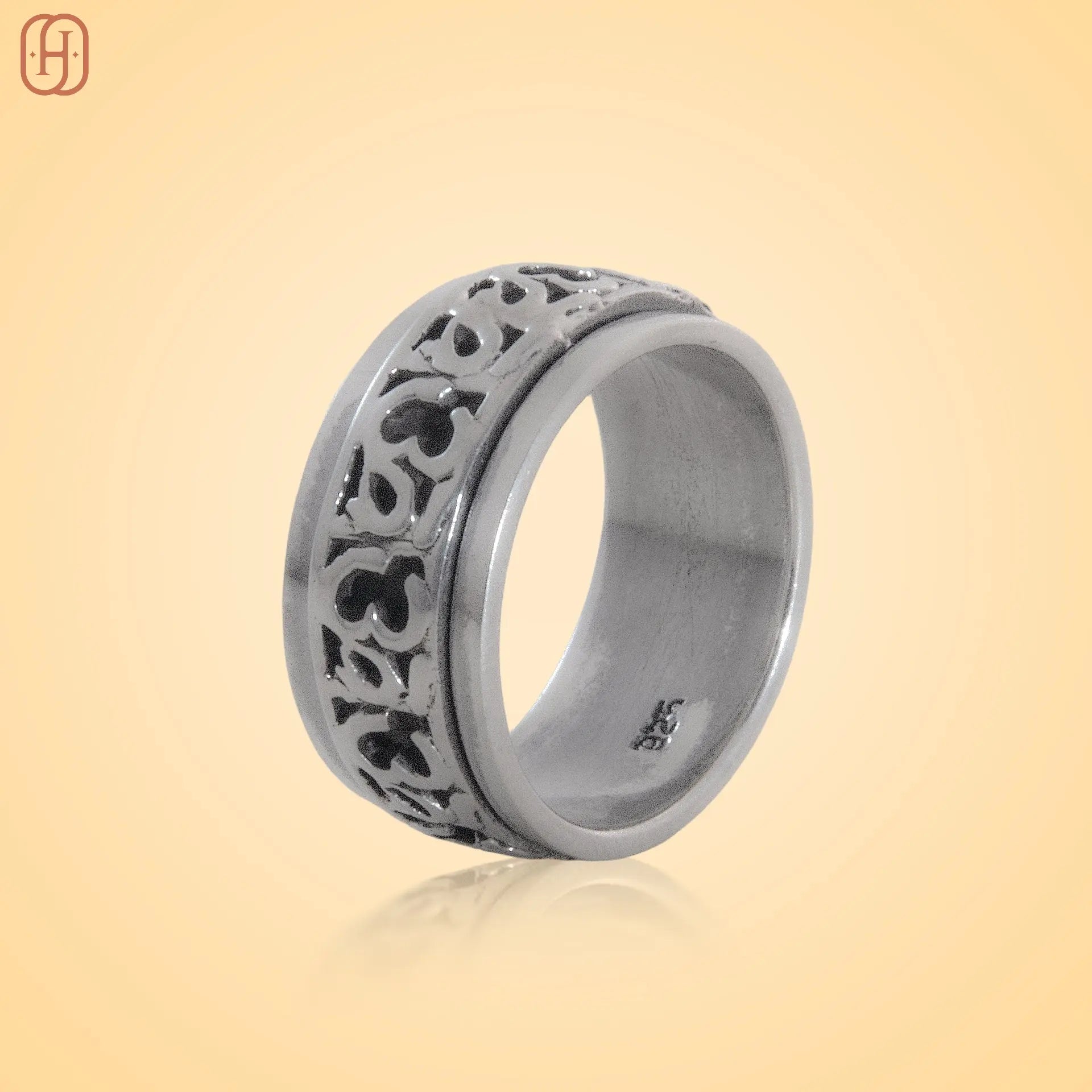Silver Om Band jewelry featuring a dome-shaped ring with blue stones from Hardik Jewels