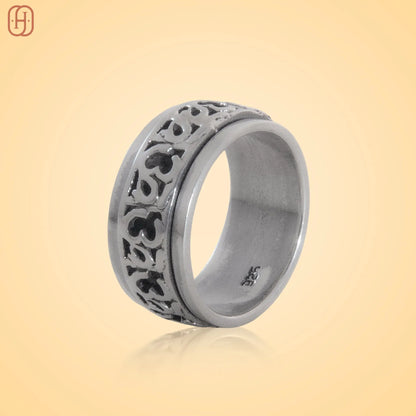 Silver Om Band jewelry featuring a dome-shaped ring with blue stones from Hardik Jewels