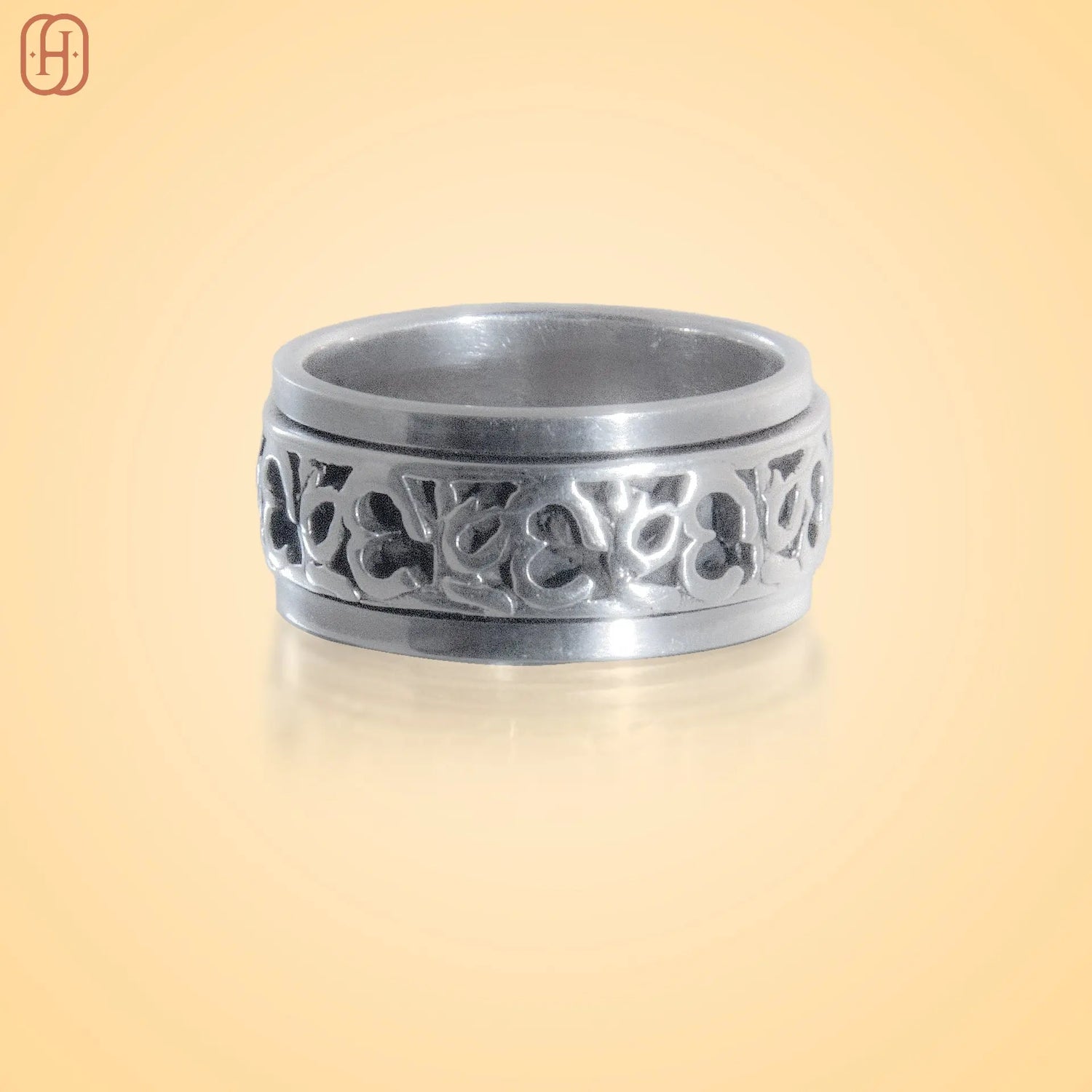 Hardik Jewels Silver Om Band jewelry with green braided thread and intricate silver design centerpiece