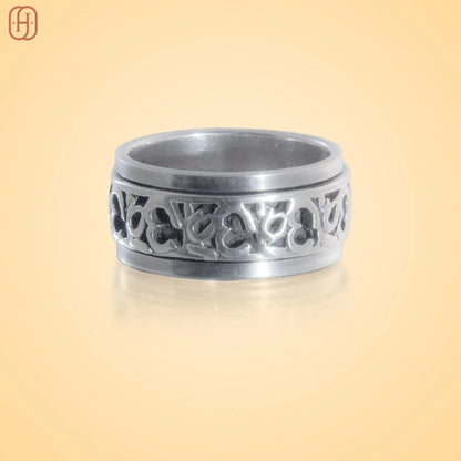 Hardik Jewels Silver Om Band jewelry with green braided thread and intricate silver design centerpiece