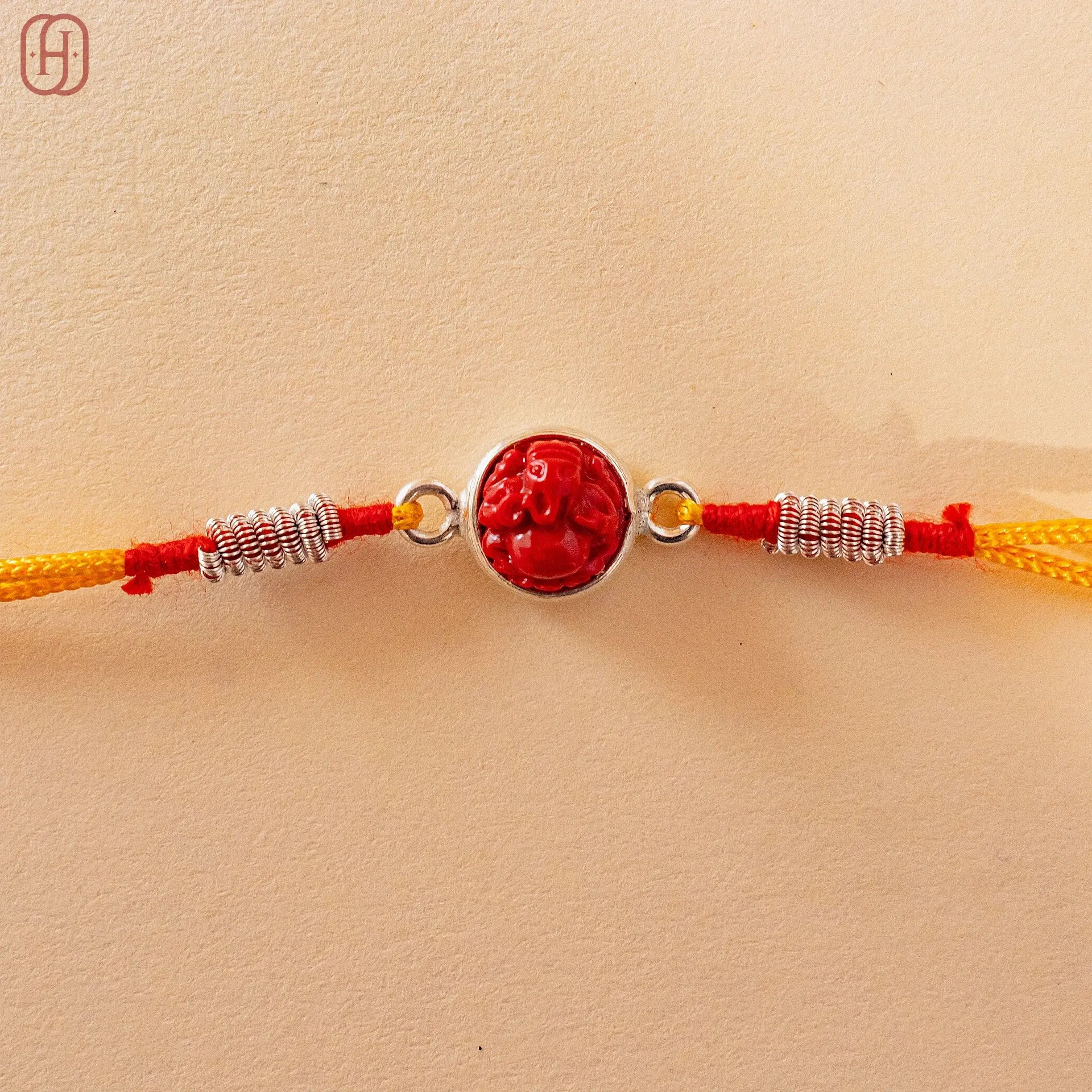 Hardik Jewels Single Rudraksha Silver Rakhi Bracelet.
