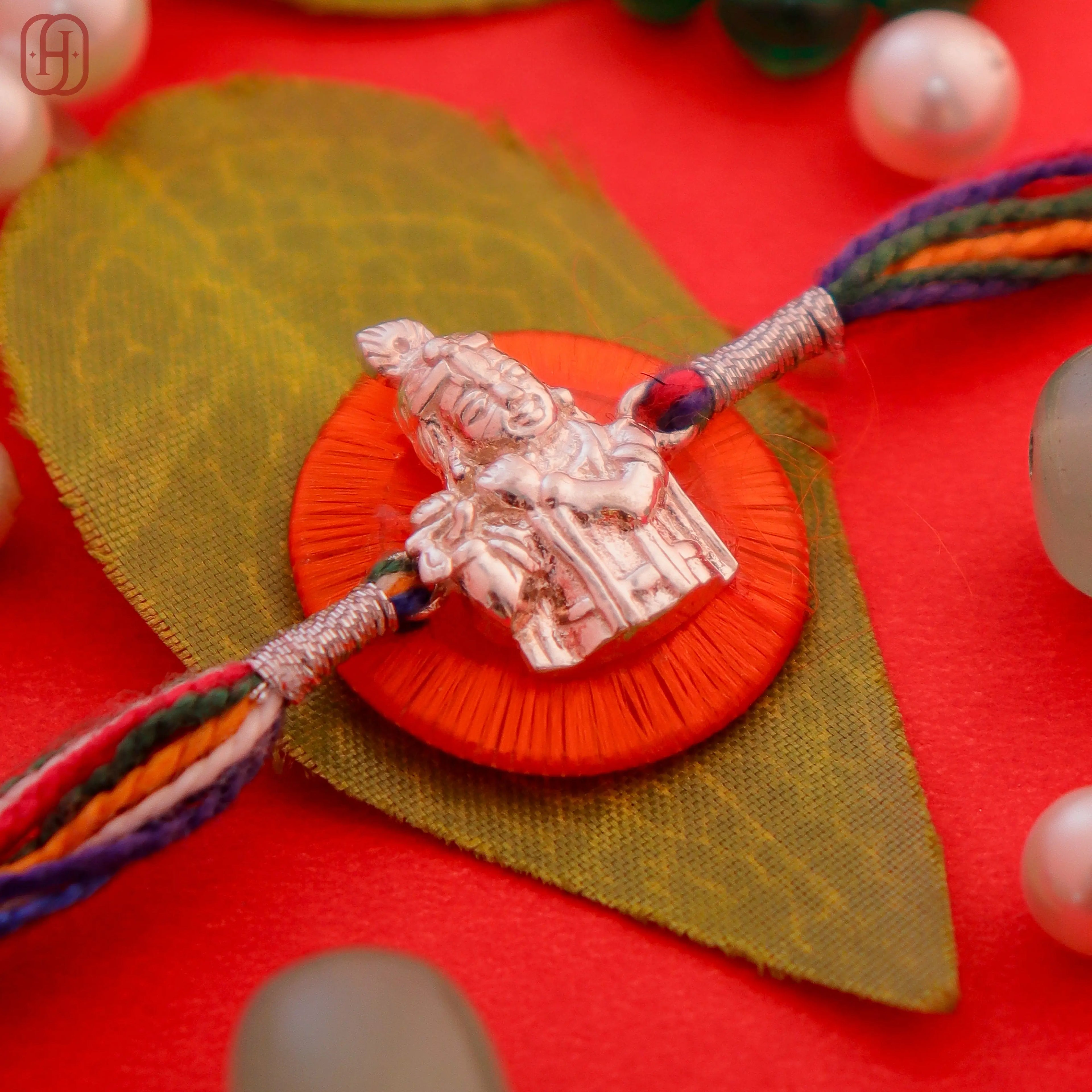 Hardik Jewels Sterling Silver Krishna Rakhi for Festivities.