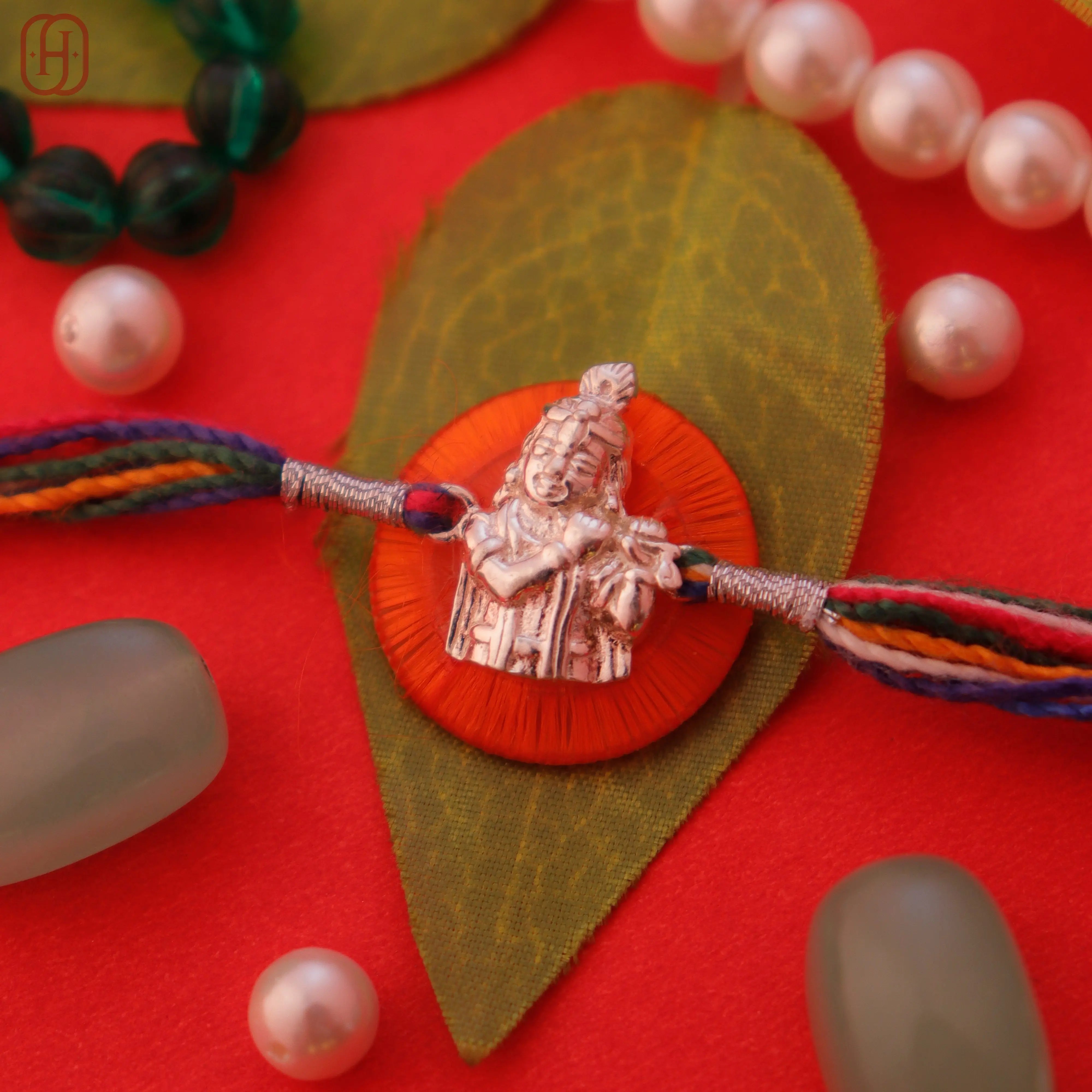 Hardik Jewels Sterling Silver Krishna Rakhi for Festivities.