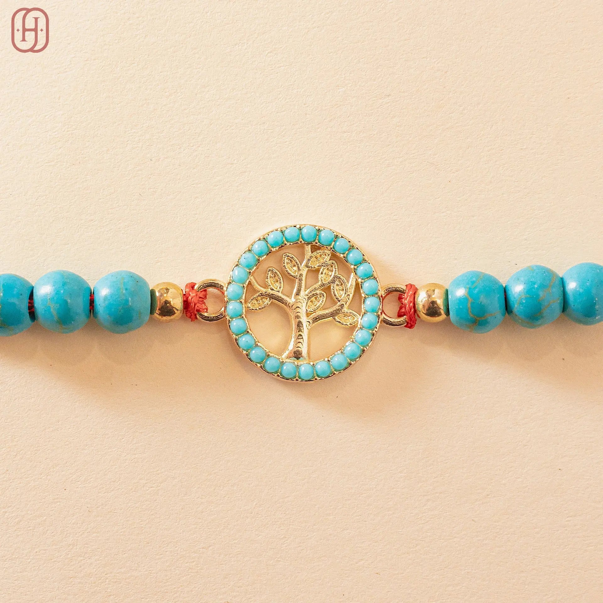 Hardik Jewels Tree of Life Rakhi Silver with Turquoise Beads.