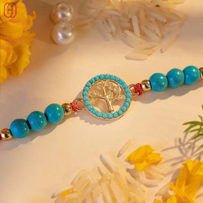 Hardik Jewels Tree of Life Rakhi Silver with Turquoise Beads.