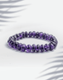 Natural Amethyst gemstone bracelet featuring smooth purple rondelle-shaped beads on a white background.