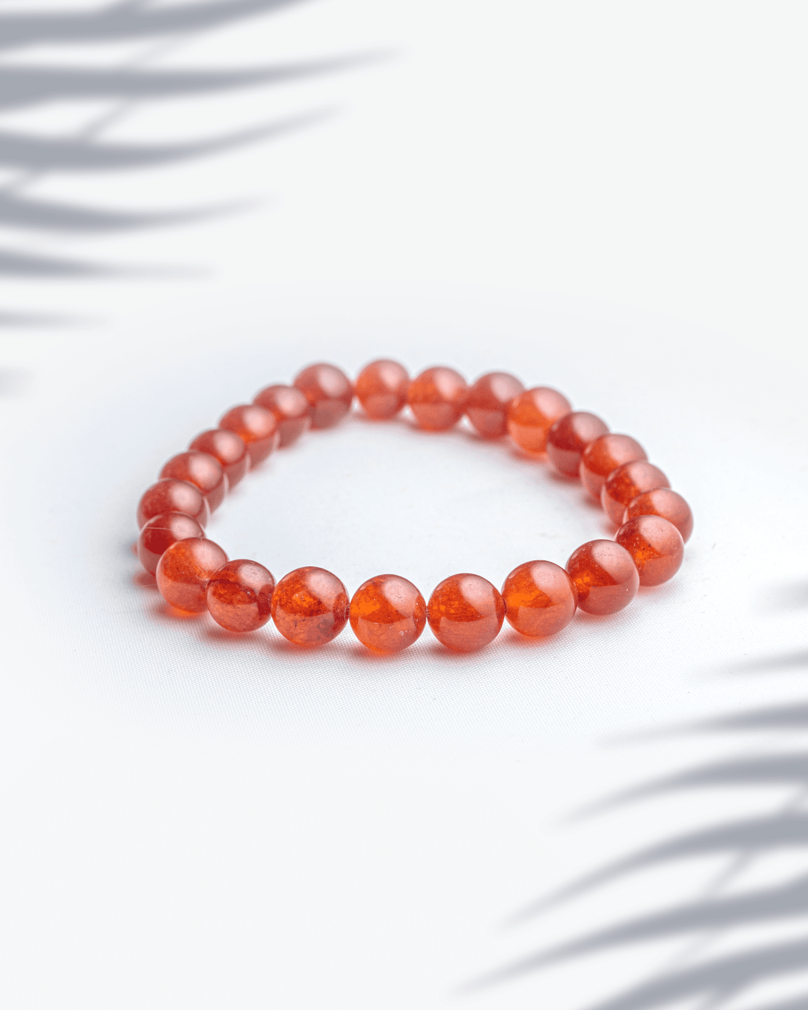 Natural Carnelian gemstone bracelet featuring 8mm orange round beads for motivation and creativity.