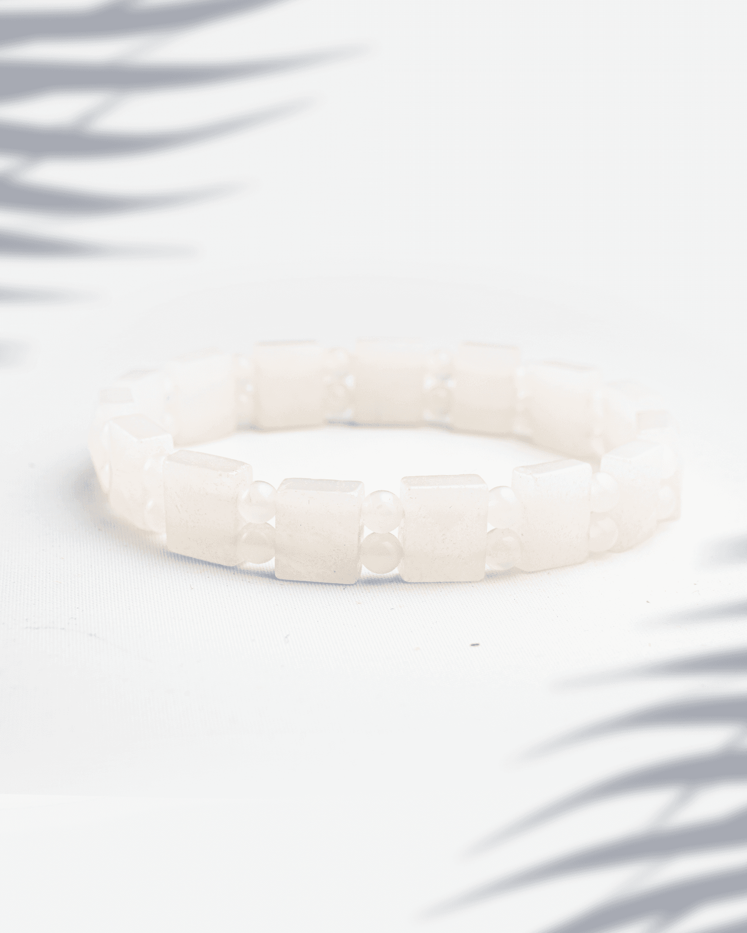 Natural Moonstone gemstone bracelet featuring rectangular white tiles separated by small round beads.