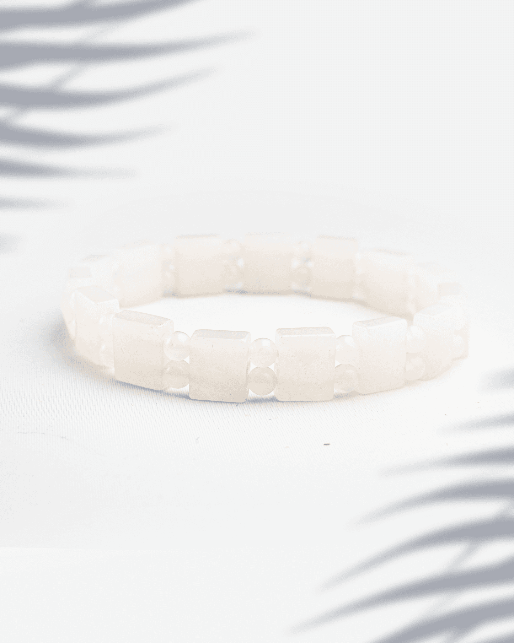 Natural Moonstone gemstone bracelet featuring rectangular white tiles separated by small round beads.