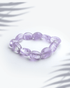 Natural amethyst gemstone bracelet featuring organic tumbled purple nugget beads for peace and spirituality.