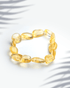 Natural citrine gemstone bracelet featuring organic tumbled yellow nugget beads for wealth and abundance.