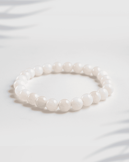 Natural gemstone bracelet featuring a mix of pink Rose Quartz and white Moonstone beads.