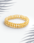 Natural golden rutilated quartz beaded bracelet with visible golden needle inclusions for wealth healing.
