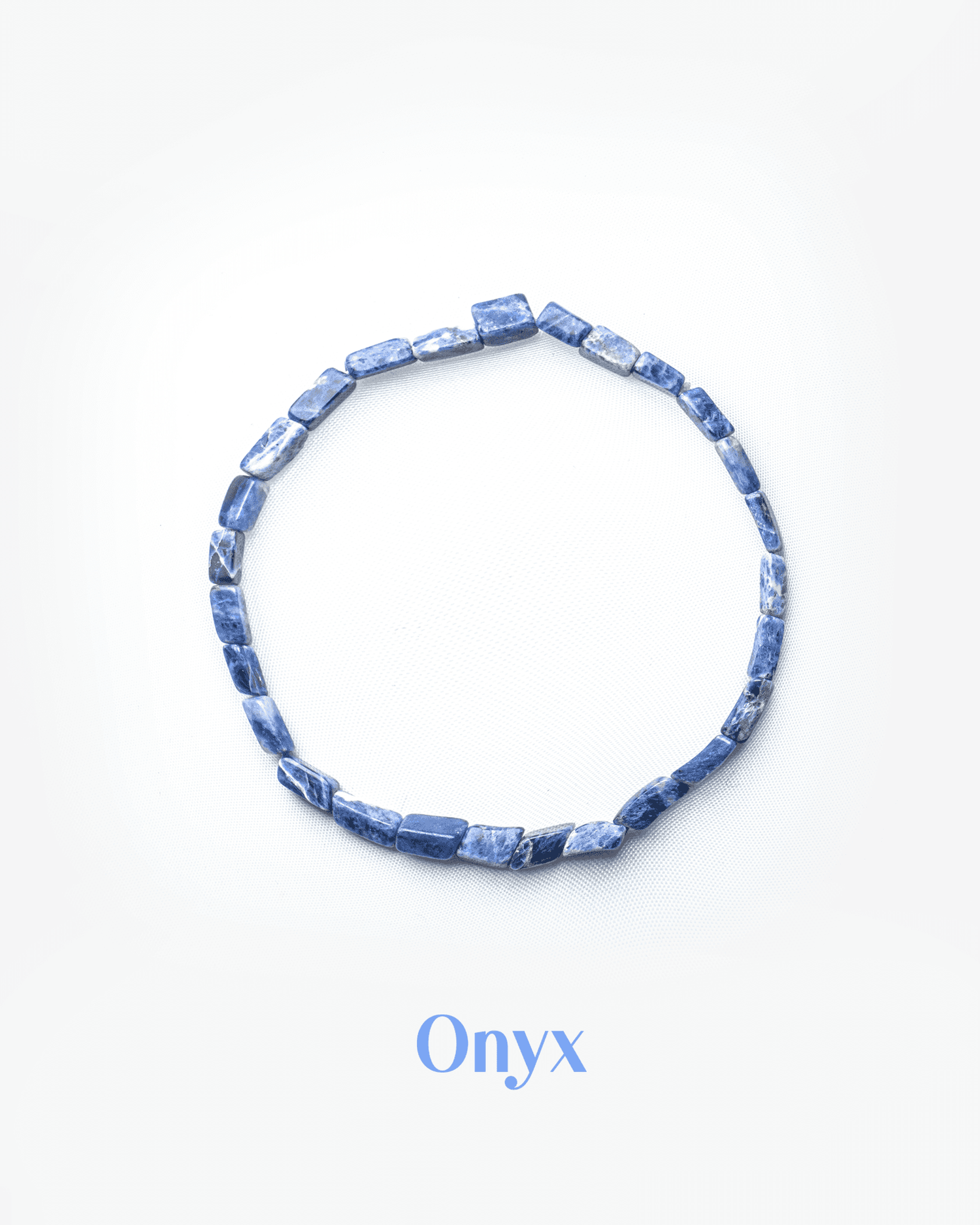 Natural sodalite gemstone bracelet featuring blue rectangular tube beads for logic and truth.