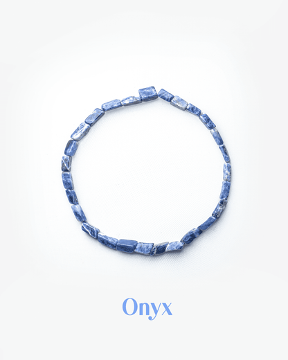 Natural sodalite gemstone bracelet featuring blue rectangular tube beads for logic and truth.
