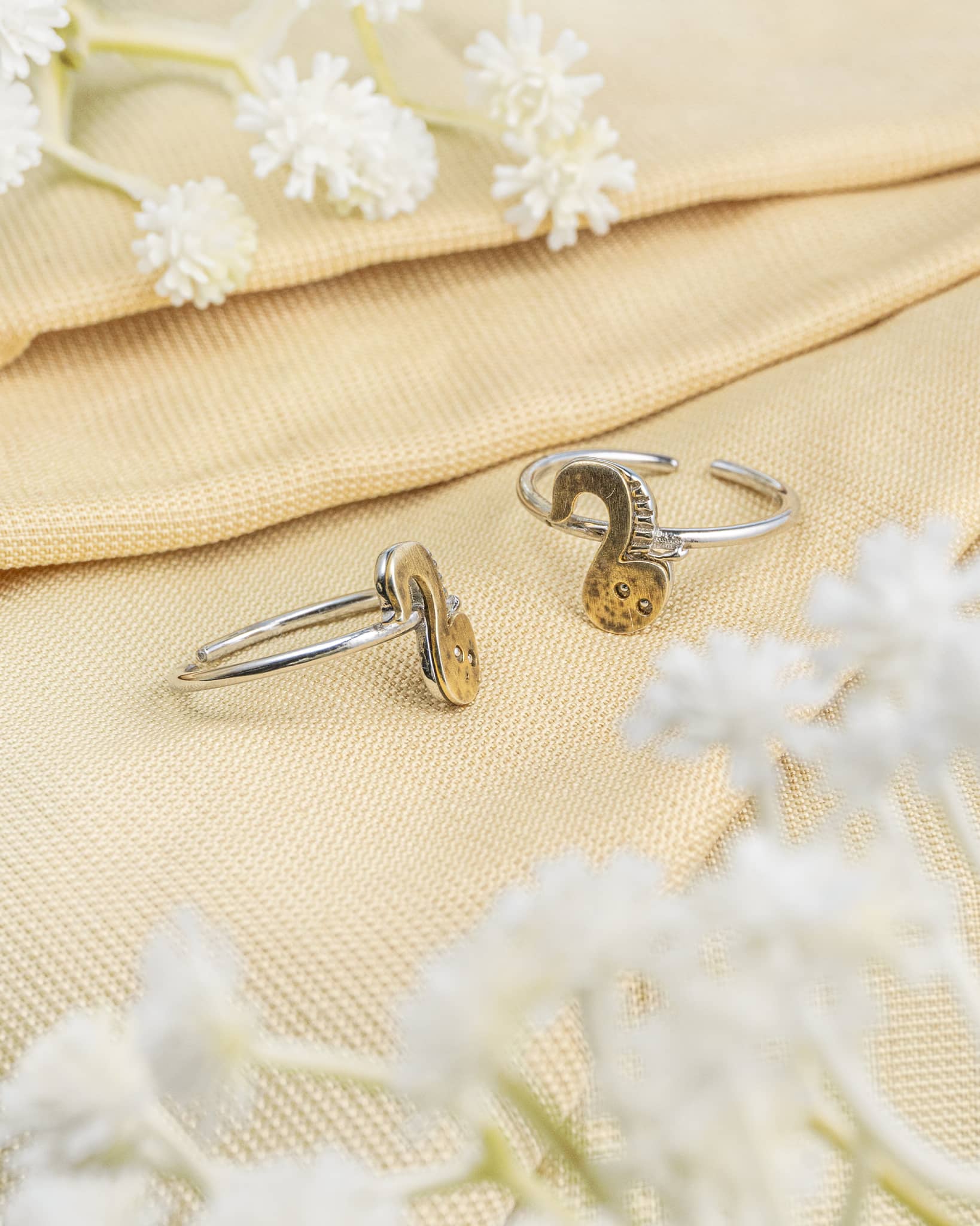 Pair of gold plated 92.5 sterling silver adjustable toe rings featuring a stone studded turtle kachua design.