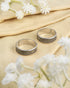 Pair of oxidized 92.5 sterling silver band toe rings featuring a geometric criss-cross mesh design.