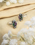 Pair of oxidized 92.5 sterling silver toe rings featuring a 4-stone cluster of green purple and white stones.