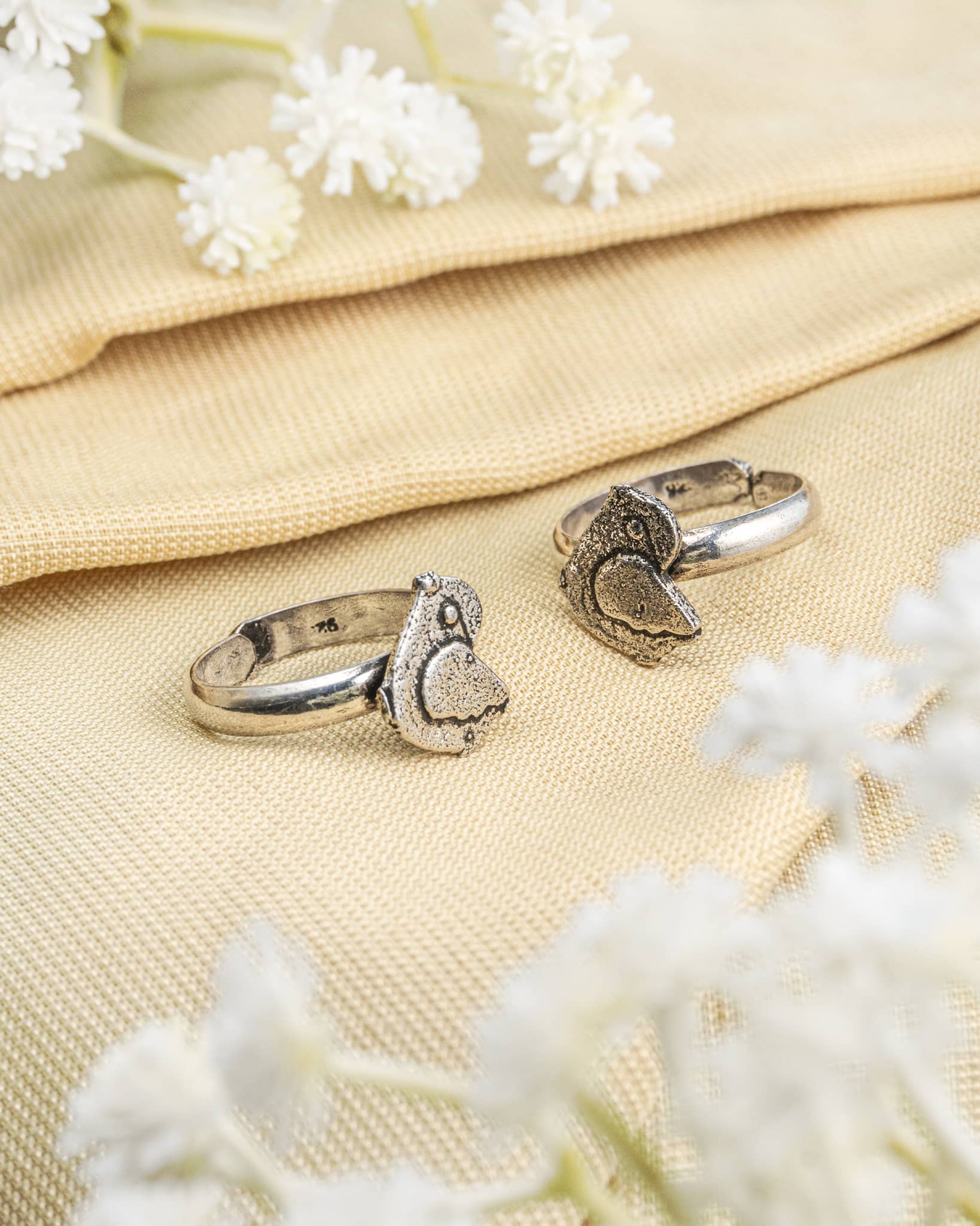 Pair of oxidized 92.5 sterling silver toe rings featuring a tribal bird parrot motif.