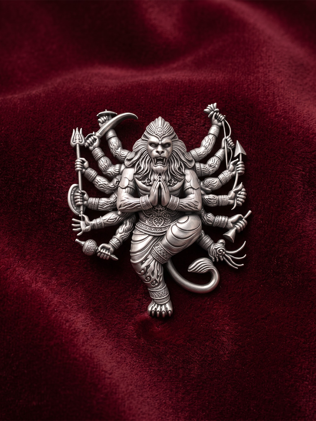 Oxidized 925 silver Narsimha multi arm lion god brooch on maroon fabric