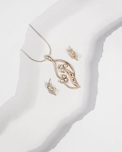 Rose gold plated 925 sterling silver pendant and earring set featuring a leaf shape with clover flowers and CZ stones (chain not included).