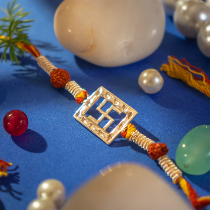 Silver Om Rakhi Online - Handcrafted by Hardik Jewels.