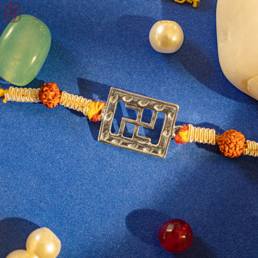 Silver Om Rakhi Online - Handcrafted by Hardik Jewels.