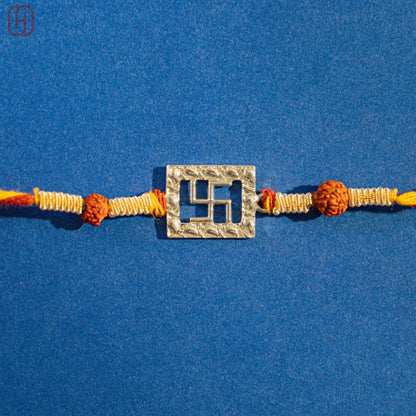 Silver Om Rakhi Online - Handcrafted by Hardik Jewels.
