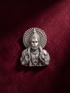 Oxidized 925 silver Hanuman blessing bust button with halo on maroon fabric