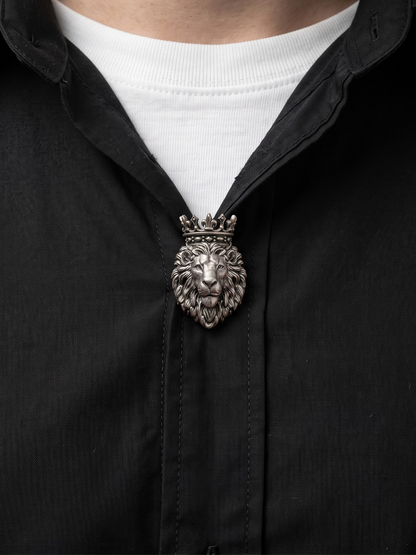 Silver crowned lion button clipped on a shirt for men