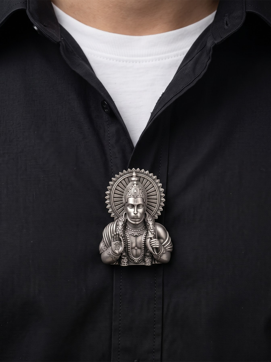 Silver Hanuman bust button clipped on a shirt for men
