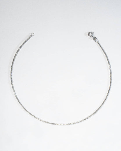 Silver necklace on a white background