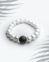 White shell pearl bracelet featuring a single black lava stone bead 9mm contrast jewelry.