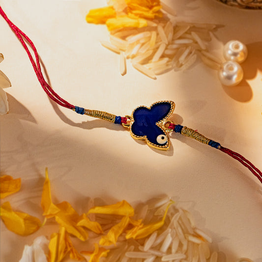 Hardik Jewels Butterfly Silver Rakhi with Blue Enamel.