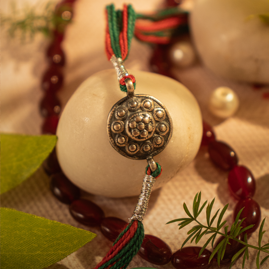 Hardik Jewels Handcrafted Silver Rakhi - Elegant Design.
