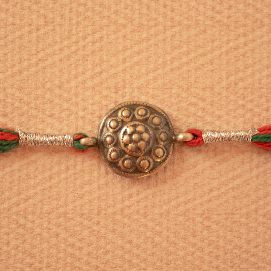 Hardik Jewels Handcrafted Silver Rakhi - Elegant Design.