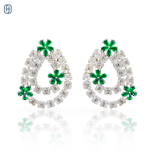Elegant emerald diamond earrings online featuring sparkling diamond accents and vibrant green emeralds