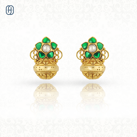 Elegant green stone Polki earrings with intricate golden design and pearl accents