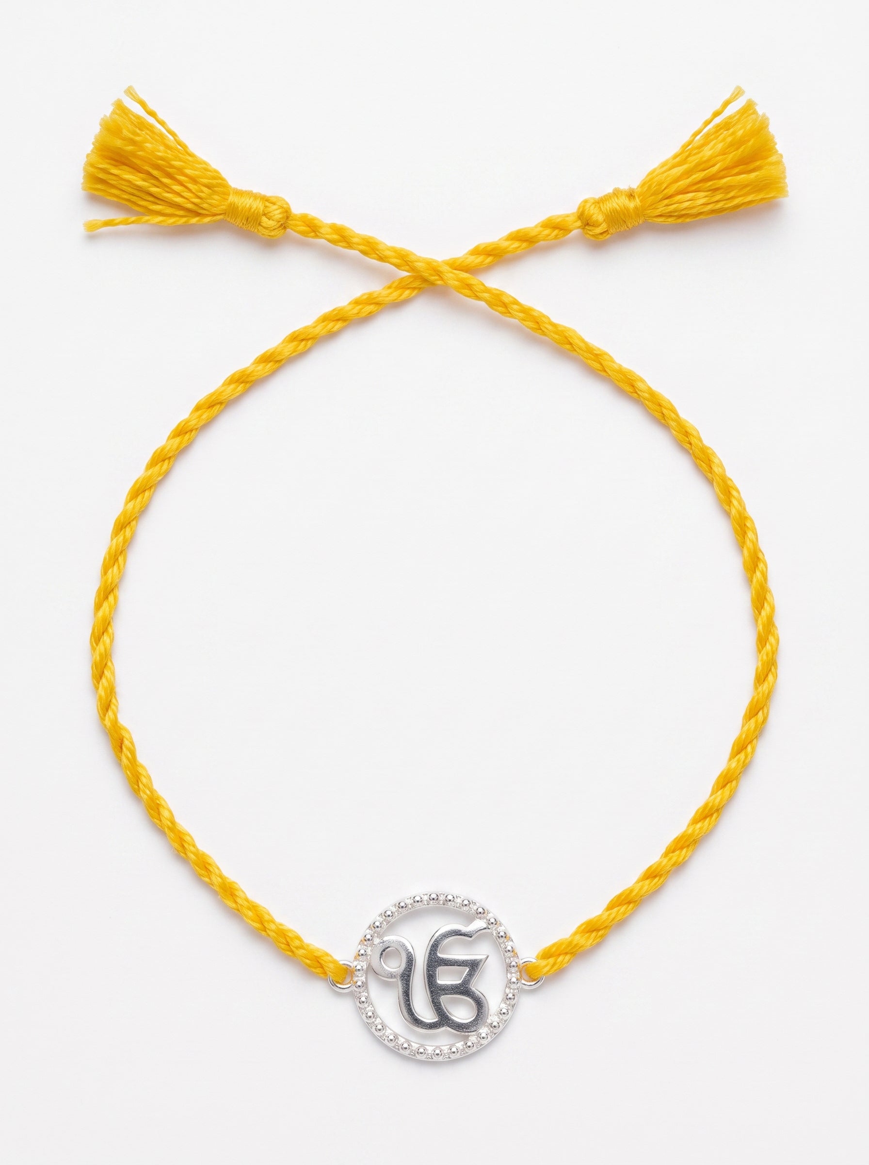 Ik Onkar CZ Halo Silver Rakhi - Yellow - studio product photo - Hardik Jewels