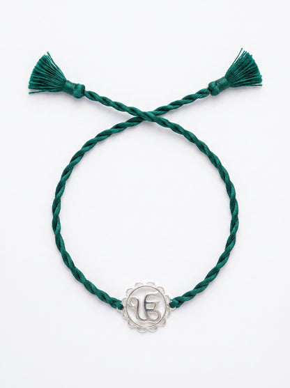 Ik Onkar Floral Silver Rakhi - Green - studio product photo - Hardik Jewels