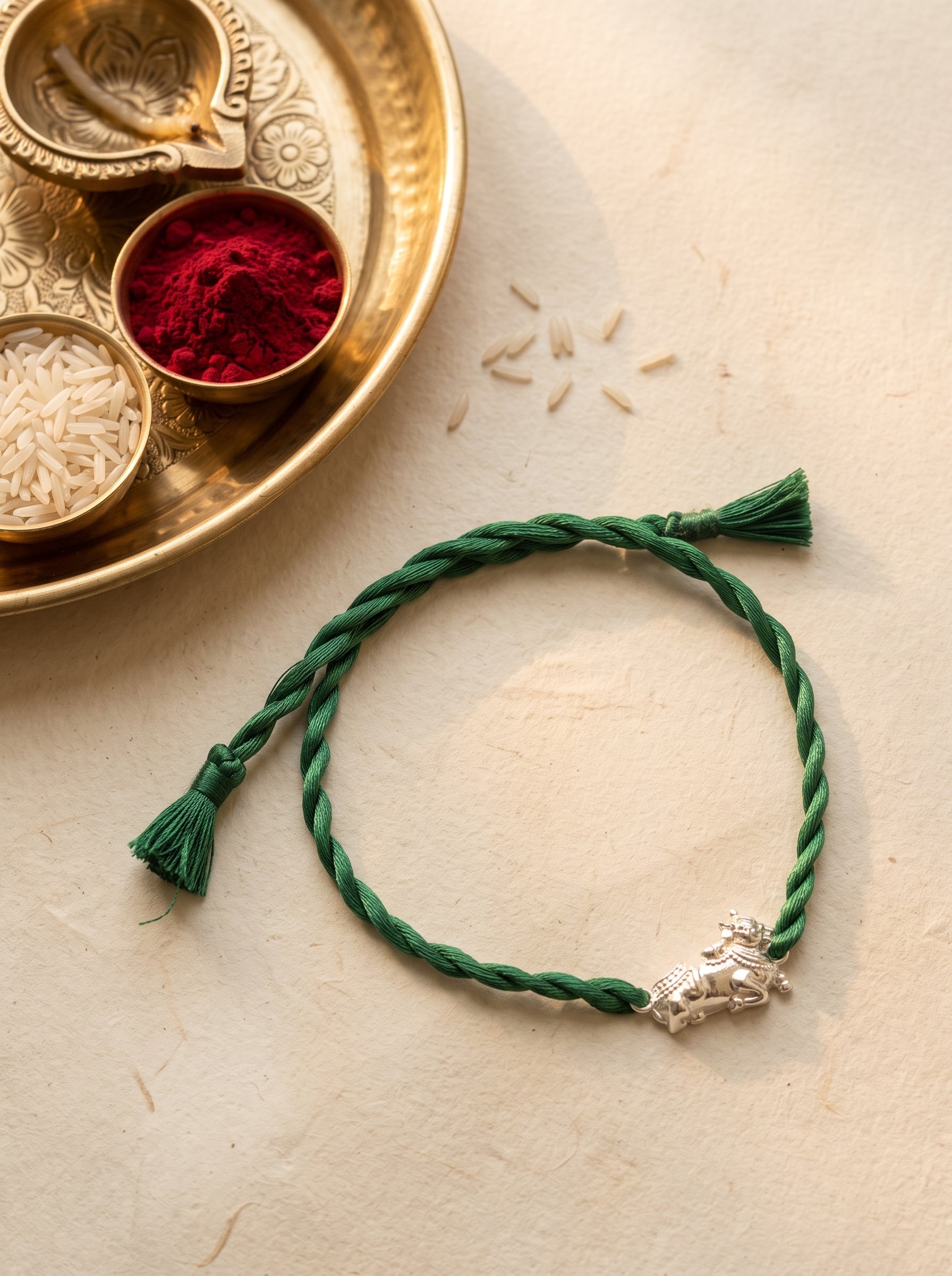 Nandi Silver Rakhi - Green Thread