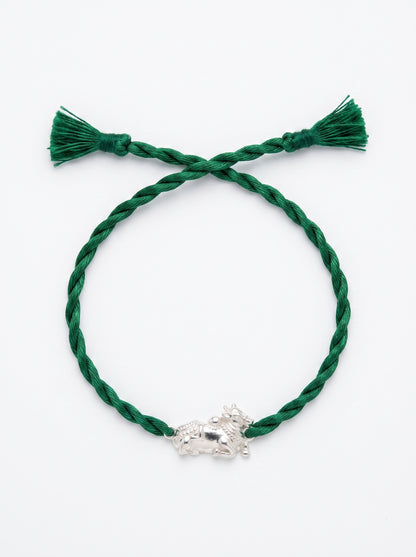 Nandi Silver Rakhi - Green Thread - studio product photo - Hardik Jewels