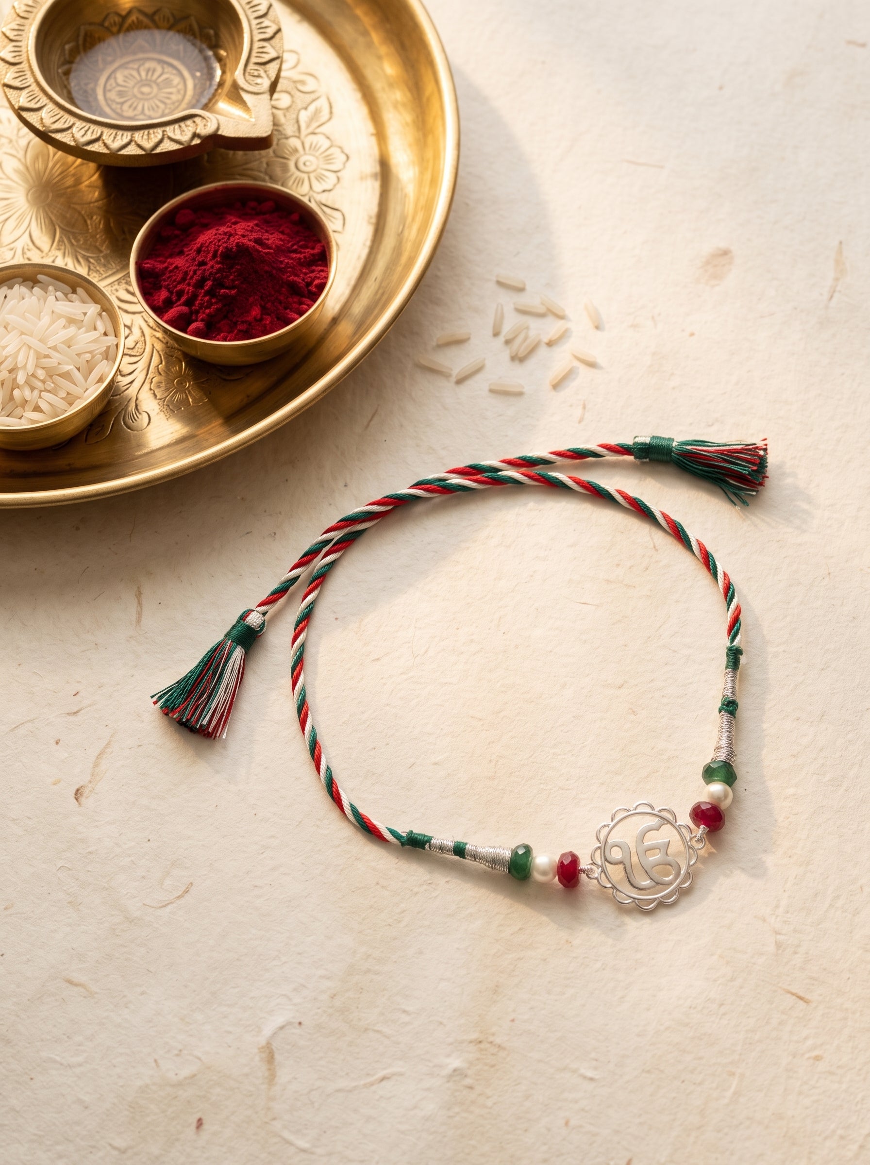 Ik Onkar Silver Rakhi with Beads - Tricolour