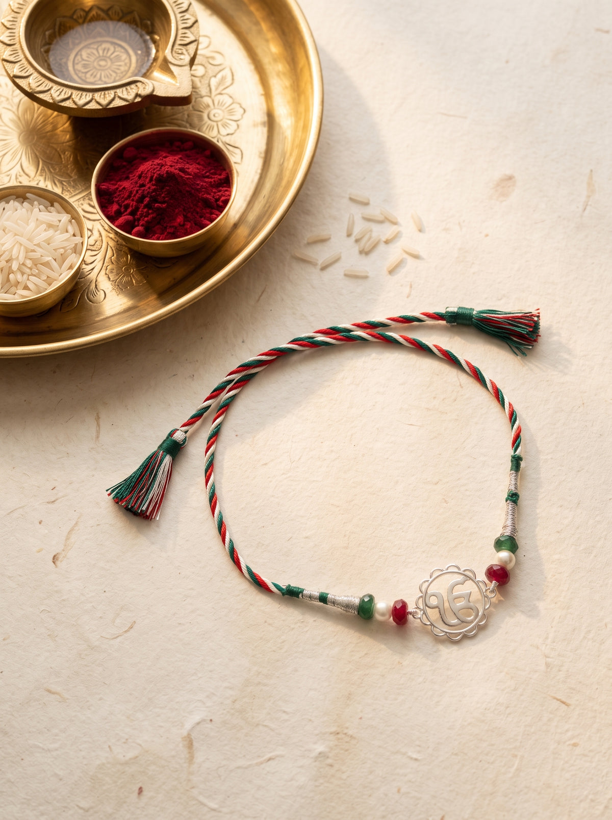 Ik Onkar Silver Rakhi with Beads - Tricolour